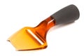 Plastic cheese knife Royalty Free Stock Photo