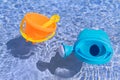 Floating toys in the swimming pool Royalty Free Stock Photo