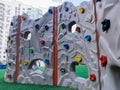 A plastic children`s wall for climbing on a playground Royalty Free Stock Photo