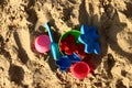 Plastic children toys, molds in a sandpit or on a beach Royalty Free Stock Photo