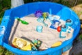 Plastic children toys for playing in sandpit or on a beach Royalty Free Stock Photo