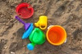 Plastic children toys on the sand Royalty Free Stock Photo