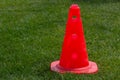 Plastic chips and cone for football training. Sports playground with markings on an artificial lawn on a soccer field Royalty Free Stock Photo