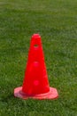 Plastic chips and cone for football training. Sports playground with markings on an artificial lawn on a soccer field Royalty Free Stock Photo