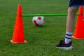 Plastic chips and cone for football training. Sports playground with markings on an artificial lawn on a soccer field Royalty Free Stock Photo