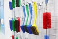 plastic cleaning brushes in supermarket hanger