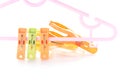 Plastic clothes pegs isolated on white background. Royalty Free Stock Photo