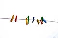 Plastic clothes pins, laundry hook, colorful, pegs, rope ,outside, sun ,green, summer decorations,