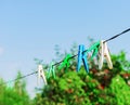 Plastic clothespins laundry hook colorful rope Royalty Free Stock Photo