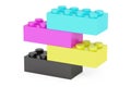 Plastic cmyk toy construction blocks, 3D rendering