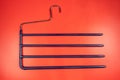 Plastic coat hanger clothes hanger on red background