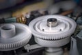 Plastic cogs and gears inside printer. Royalty Free Stock Photo