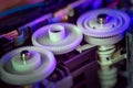 Plastic cogs and gears inside printer. Royalty Free Stock Photo