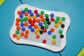 Plastic colored mosaic game on the table Royalty Free Stock Photo