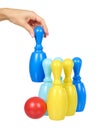 Plastic colored skittles for bowling game. Kids toy Royalty Free Stock Photo