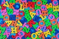 Plastic colorful alphabet letters on a blue Royalty Free Stock Photo