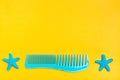 Plastic comb and two hairpins in the form of a starfish Royalty Free Stock Photo