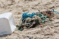 Plastic commercial fishing rope and net pollution on a beach