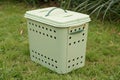 Plastic compost bin with ventilation holes Royalty Free Stock Photo