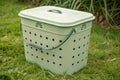 Plastic compost bin with ventilation holes Royalty Free Stock Photo