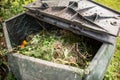 Plastic composter in a garden Royalty Free Stock Photo