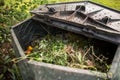 Plastic composter in a garden Royalty Free Stock Photo