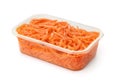 Plastic container of pickled shredded carrot