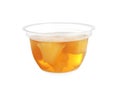 Plastic container with tasty pineapple jelly