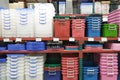 Plastic containers in houseware store.storage boxes on shelf