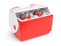 Plastic cool box or small cooler with a beer cans or soda drinks in ice isolated on white Royalty Free Stock Photo