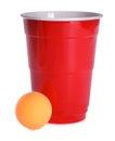 Plastic cup and ball for beer pong on white background Royalty Free Stock Photo