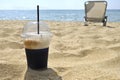cappuccino coffee on the beach Royalty Free Stock Photo