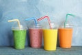 Plastic cups with delicious detox smoothies