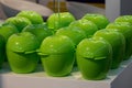 Plastic cups in the shape of green apples