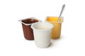 Plastic cups yogurt isolated on white background Royalty Free Stock Photo