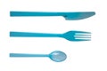 Plastic cutlery: knife, fork and spoon on a white background. Royalty Free Stock Photo