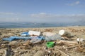 Plastic debris waste pollution trashed on sea coast ecosystem,environment nature contamination Royalty Free Stock Photo