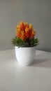 plastic decorative plants with bright colors add to the aesthetic impression of a room