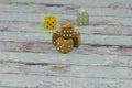 Plastic Dices on White Wooden Table: Gambling Theme Royalty Free Stock Photo