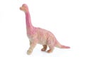 Plastic dinosaur toy on white background. Dinosaur figure plastic toy for young kid. Royalty Free Stock Photo