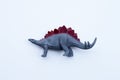 Plastic dinosaur toy on white Royalty Free Stock Photo
