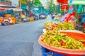 The plastic dish with Manila tamarind in Mahanak Fruit Market of Bangkok, Thailand