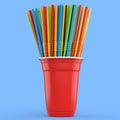 Plastic disposable party cup for coffee or fresh with heap straw on blue.