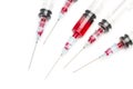 Plastic disposable syringes in a cut out view Royalty Free Stock Photo