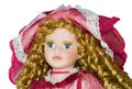 Plastic doll portrait closeup - blue eyes and curly blonde hair - beautiful doll Royalty Free Stock Photo