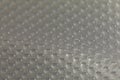 Abstract background of lots of grey pimples dots. Plastic surface with pimples Royalty Free Stock Photo