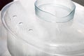 Plastic double boiler with water droplets on the lid Royalty Free Stock Photo