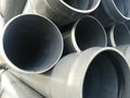 Plastic drain pipes pvc in a pile Royalty Free Stock Photo