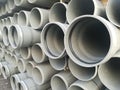 Plastic drain pipes pvc in a pile Royalty Free Stock Photo