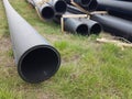 Plastic drainage pipes  pile connecting each other by the road Royalty Free Stock Photo